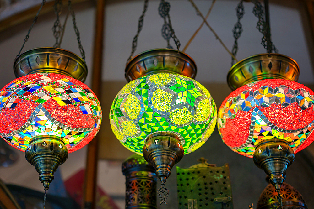 Turkish traditional colorful mosaic lamp chandeliers on a bazaar market in Izmir, Turkey