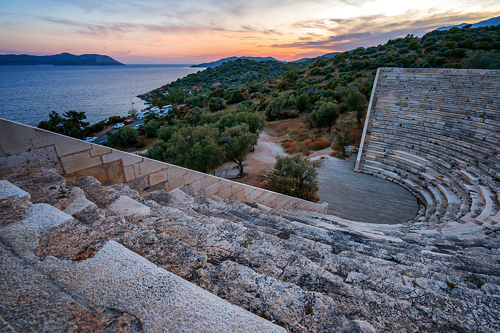 Ancient theater of Antiphellos ancient city at sunset in Kas, Turkey