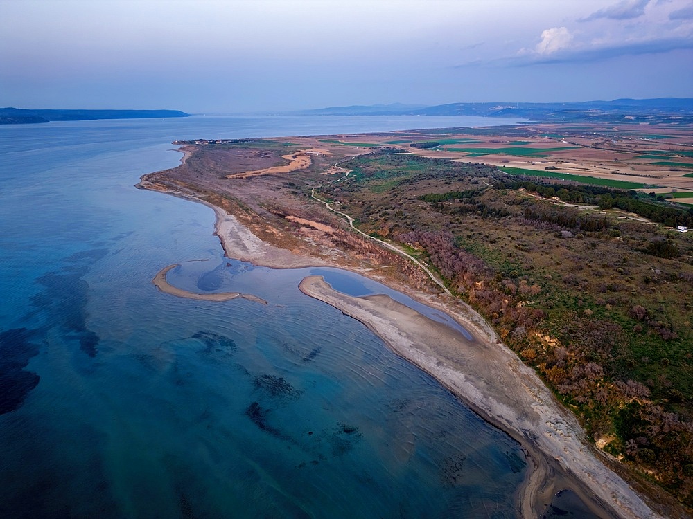 Drone aerial view of Sigeion cape in Cannakale at sunset in Turkey