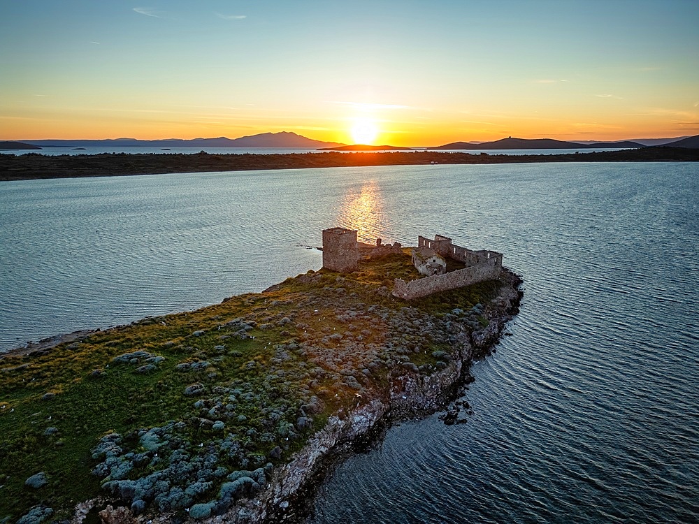 Drone view of Kizlar monastery on an island at sunset in Turkey