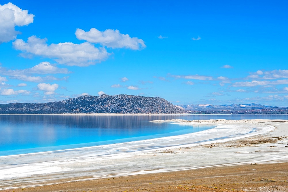 Salda lake with turquoise water and white sand on a sunny day in Turkey