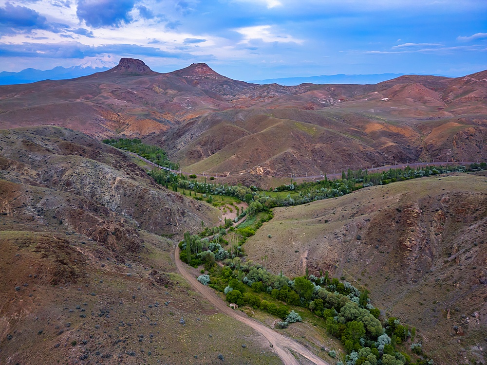 Drone aerial view of Akkoy dam lake landscape in Cappadocia at sunset, Turkey