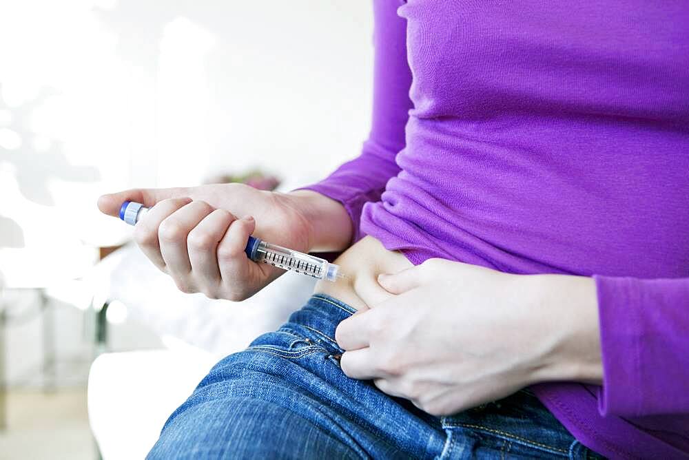 Treating diabetes in a woman