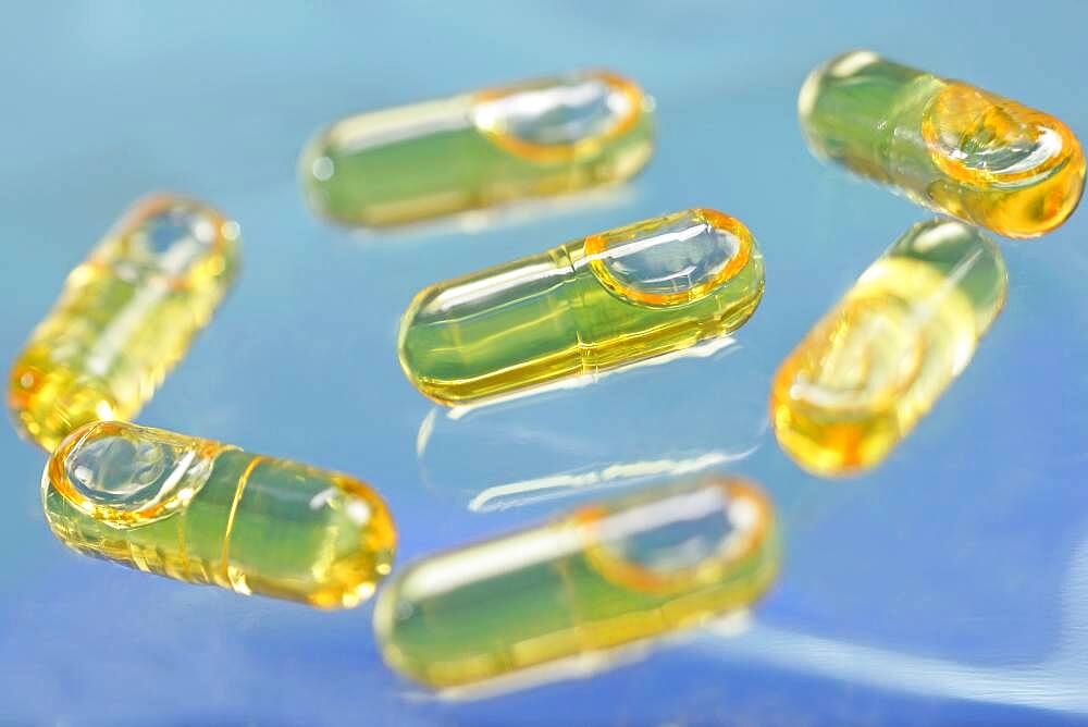 Capsules of cod liver oil. Cod liver oil is consummed mainly for its richness in vitamin A and D, but it also contains omega 3.