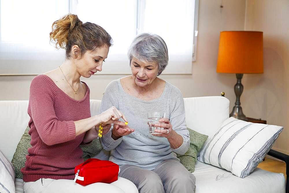 Senior woman with her carer.