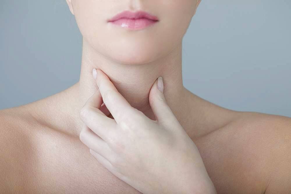 Woman with sore throat