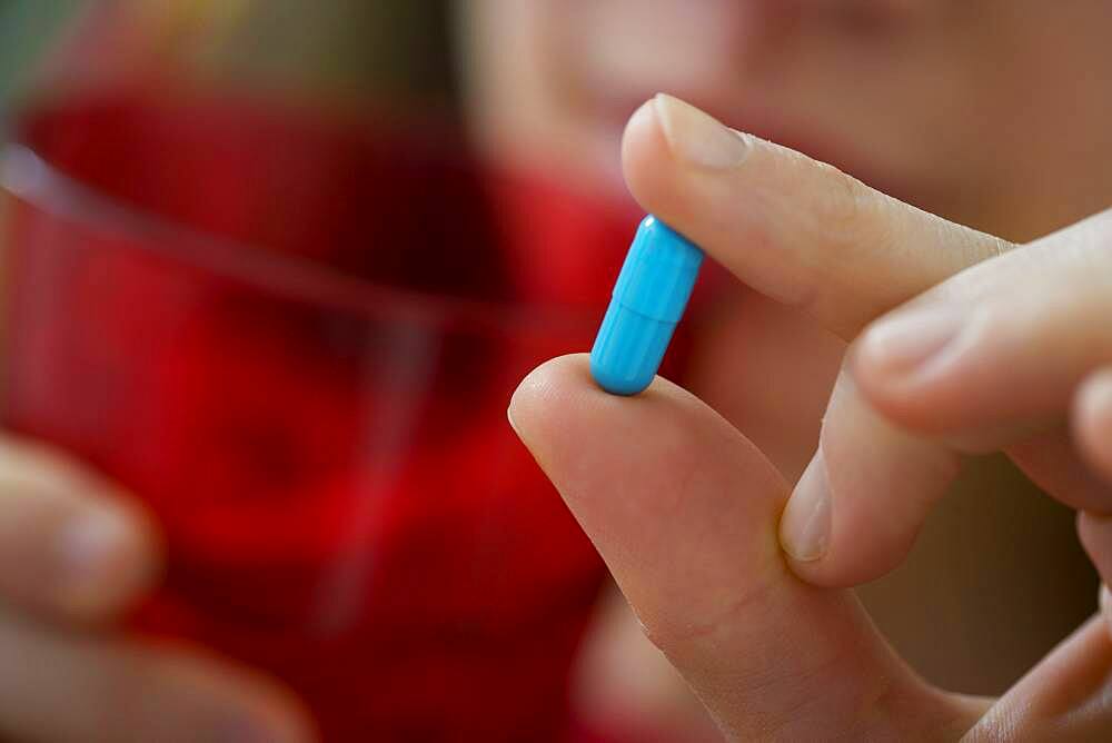 Woman taking medication