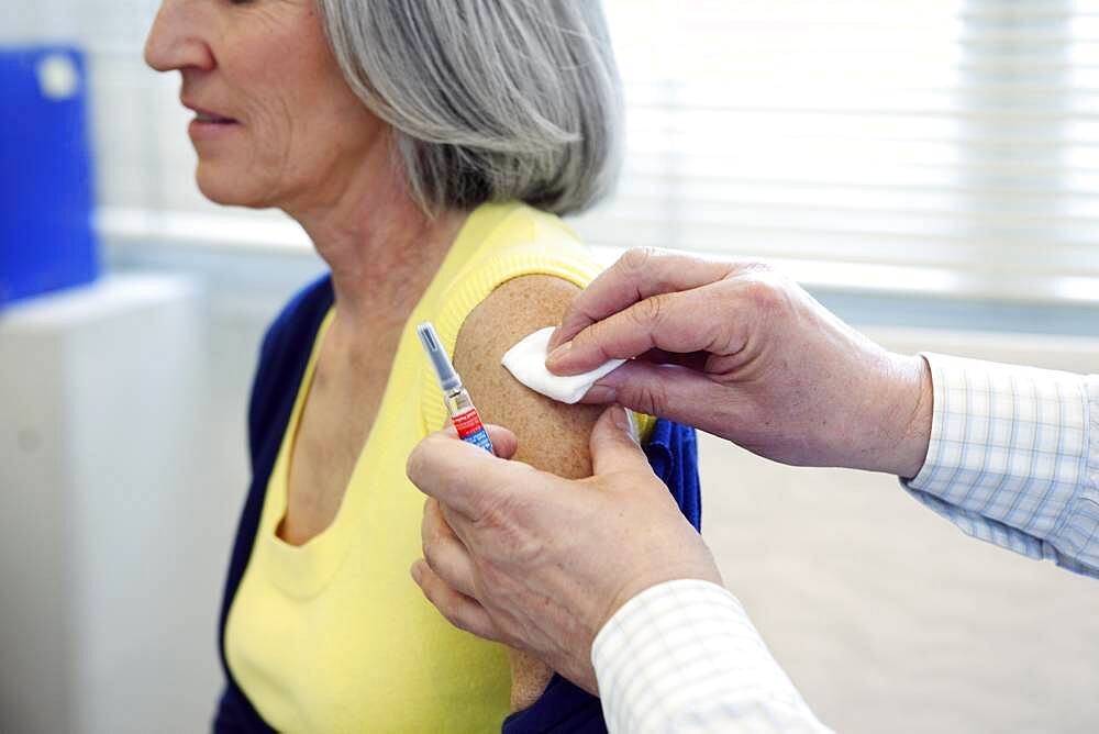 Vaccinating an elderly person