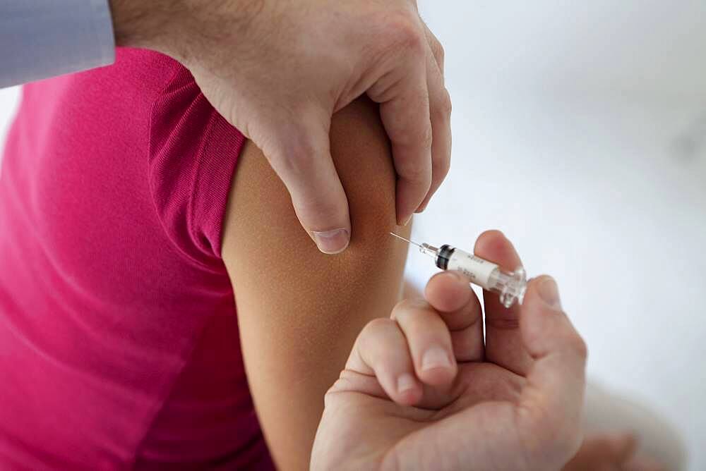 Vaccinating a woman