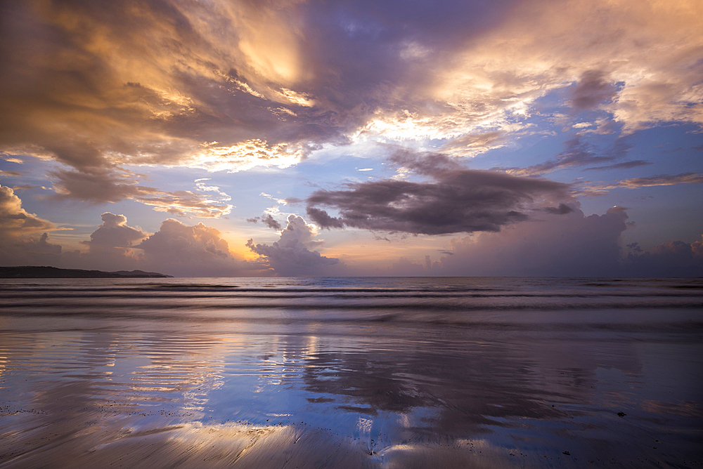 Sunrise on the beach at Magdalena Grand Beach Resort on Tobago Island, Trinidad and Tobago.