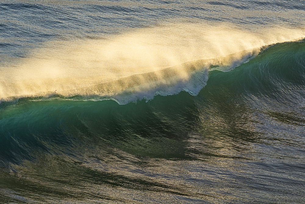 Waves breaking in Pololu Bay; North Kohala, Big Island of Hawaii.