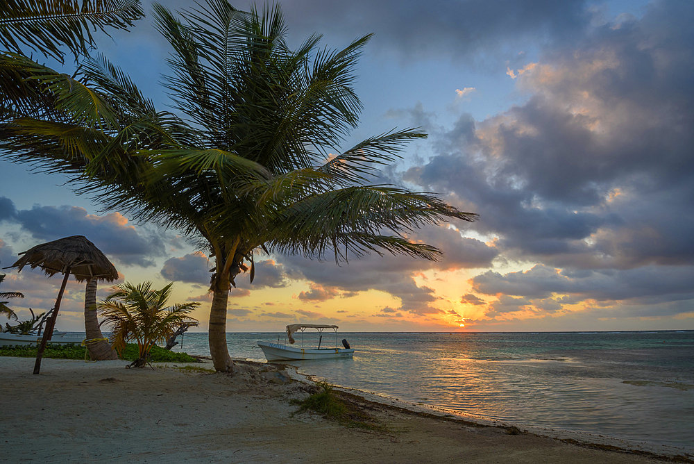 On the playa at sunrise in Mahahual, Costa Maya, Mexico.