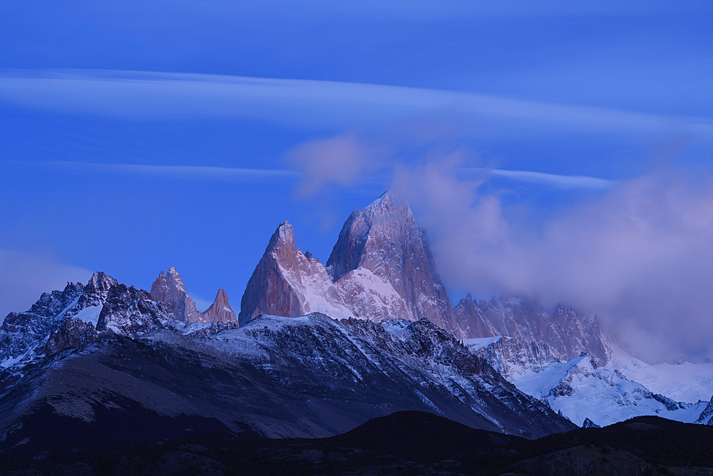 Mount Fitzroy and Cerro Poincenot at dawn from Mirador Condores in Parque Nacional Los Glaciares near El ChaltÈn, Patagonia, Argentina.