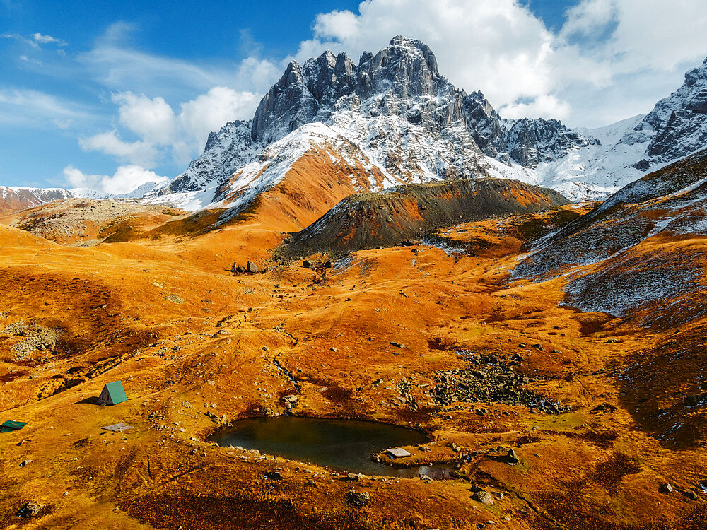 Aerial view of Chaukhi Lake and Mount Chaukhi, Juta Valley, Kazbegi, Georgia (Sakartvelo), Central Asia, Asia