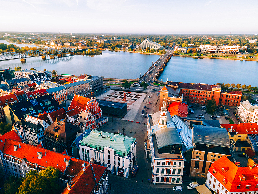 Aerial drone sunrise view of Rathausplatz and House of the Black Heads, Riga Old Town (Vecriga), UNESCO World Heritage Site, Riga, Latvia, Europe