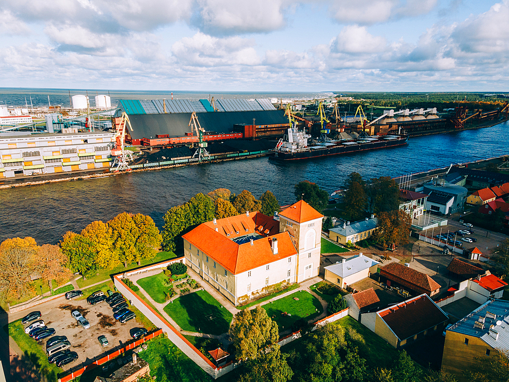 Aerial drone view of the Livonian Order Castle in Ventspils on the Venta River, Livonian Coast, Latvia, Baltic States, Europe