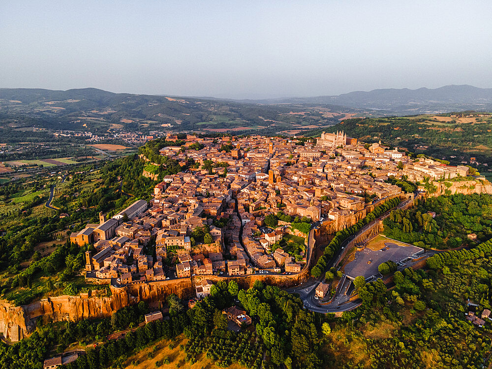 Drone view of Orvieto's Old Town cityscape at sunset, Orvieto, Umbria, Italy, Europe