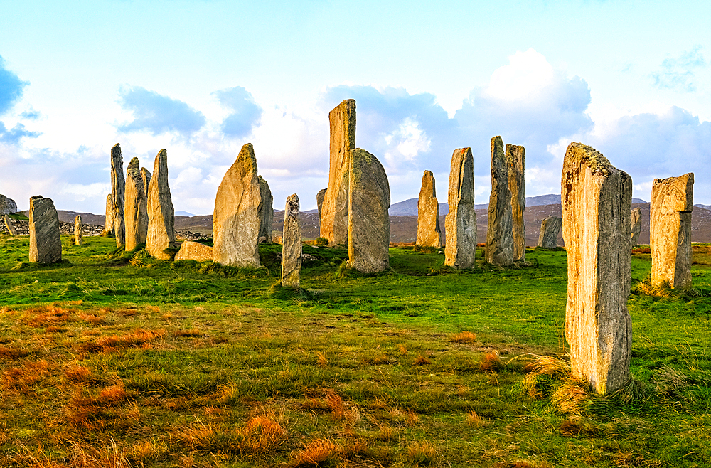 Sunrise over Callanish (Calanais) Standing Stones, the Neolithic monument in Callanish, Isle of Lewis, Outer Hebrides, Scotland, United Kingdom, Europe