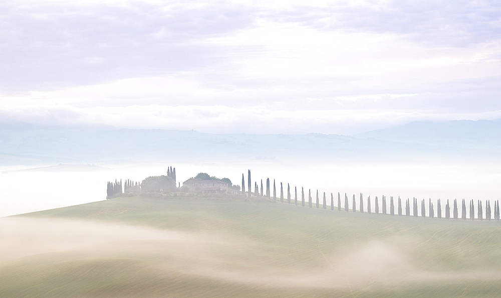 Misty morning in the Val d'Orcia, UNESCO, Tuscany, Italy