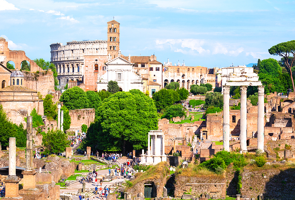 The Forum Romanum (Roman Forum), Basilica di Santa Francesca Romana and bell tower and the Colosseum, UNESCO, Rome, Lazio, Italy