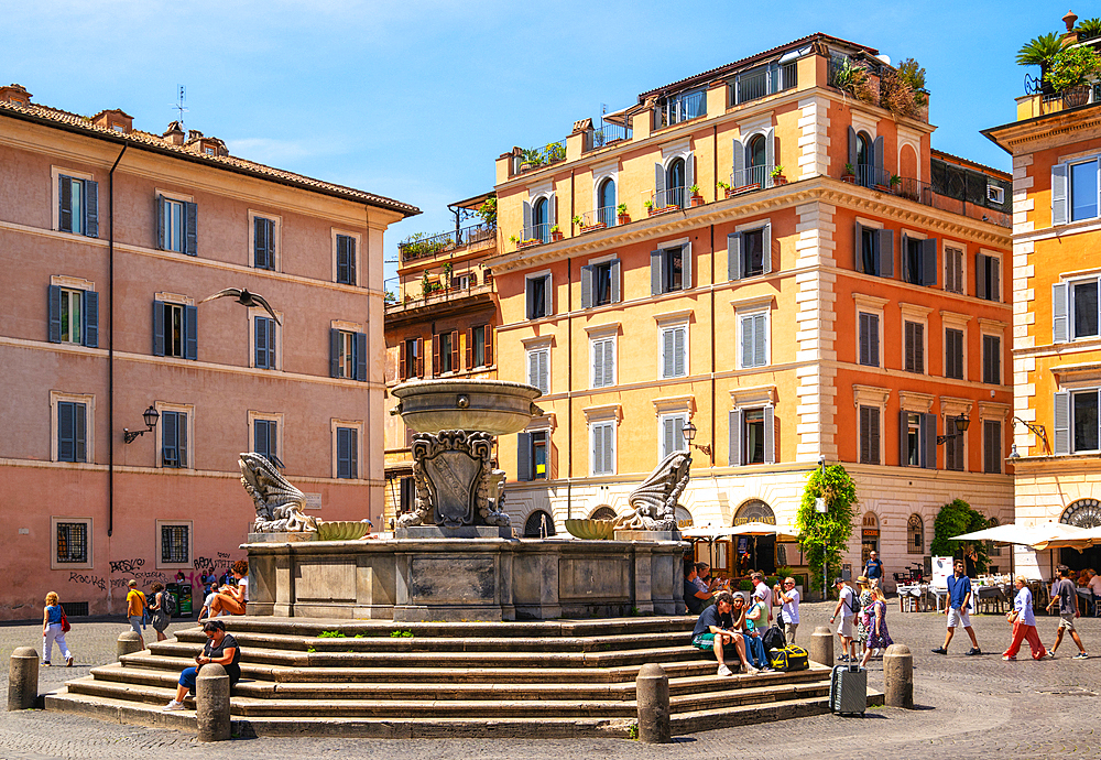 Fountain in Piazza Santa Maria in Trastevere, 8th century, possibly the oldest of Rome fountains, Rome, Lazio, Italy