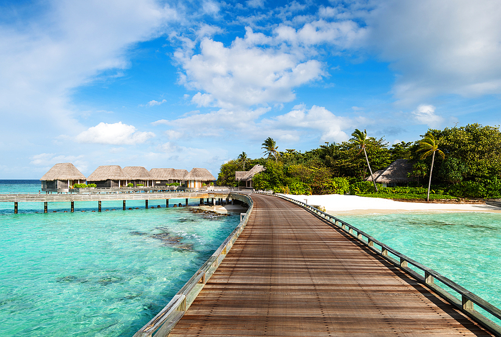 A wooden jetty in a luxury resort, Baa Atoll, Maldives