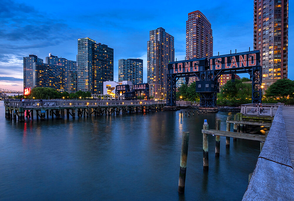 Gantry Plaza State Park at night with Long Island restored Gantries, Long Island City, New York, United States of America, North America