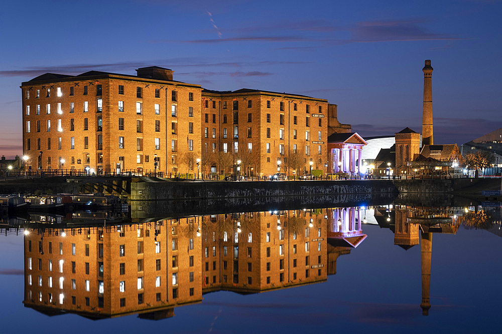 The Albert Dock and Pumphouse reflected in Salthouse Dock at night, Liverpool Waterfront, Liverpool, Merseyside, England, United Kingdom, Europe