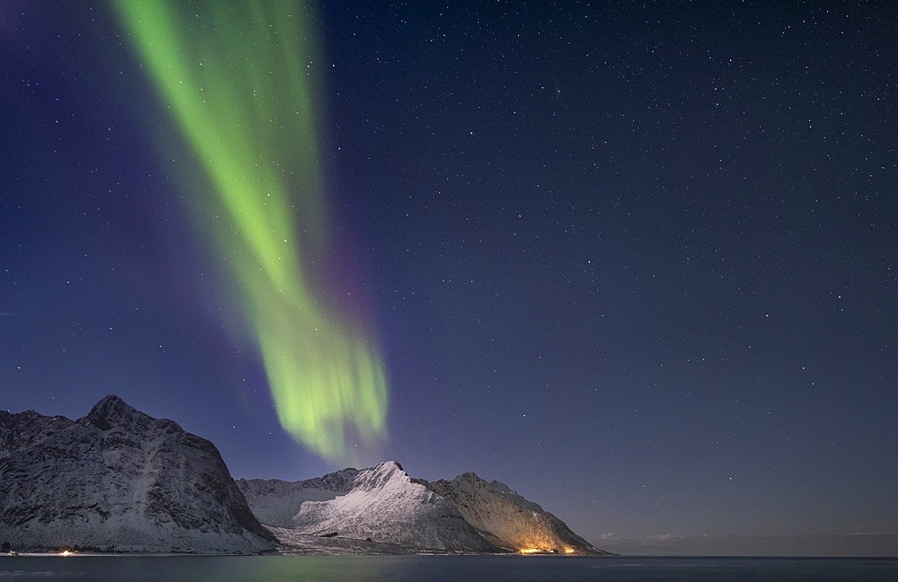 The Aurora Borealis (Northern Lights) over Steinfjord and Skinnarmen mountain, Senja, Troms og Finnmark county, Norway, Scandinavia, Europe