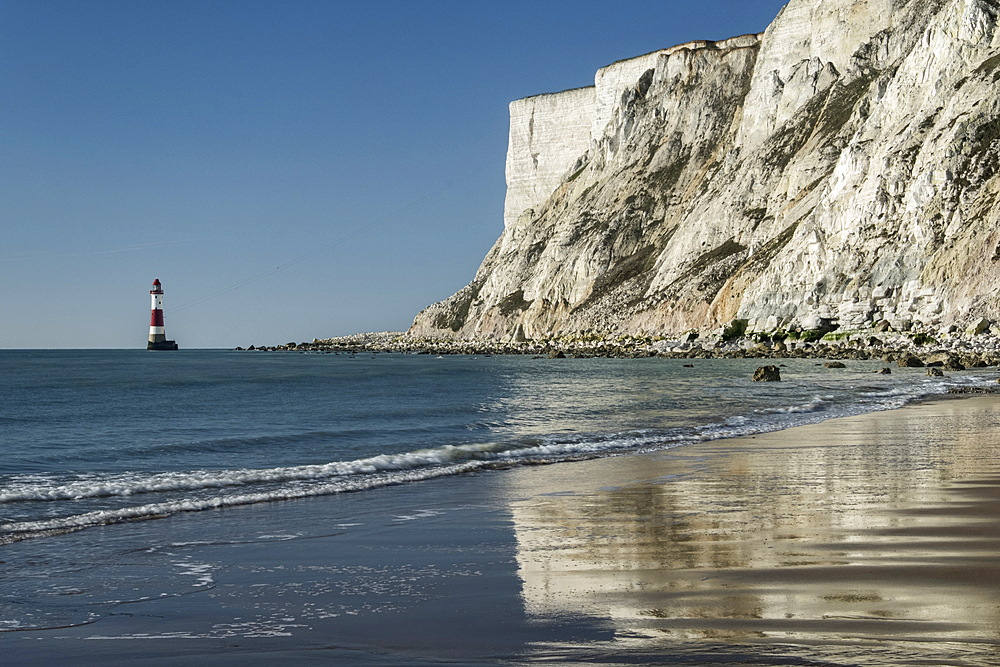 Beachy Head Lighthouse and Beachy Head white chalk cliffs from the beach, Beachy Head, near Eastbourne, South Downs National Park, East Sussex, England, United Kingdom, Europe