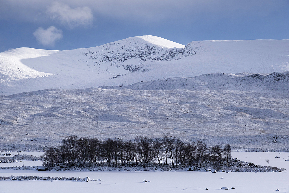 A frozen Loch Ba backed by Beinn a Chreachain in winter, Rannoch Moor, Argyll and Bute, Scottish Highlands, Scotland, United Kingdom, Europe