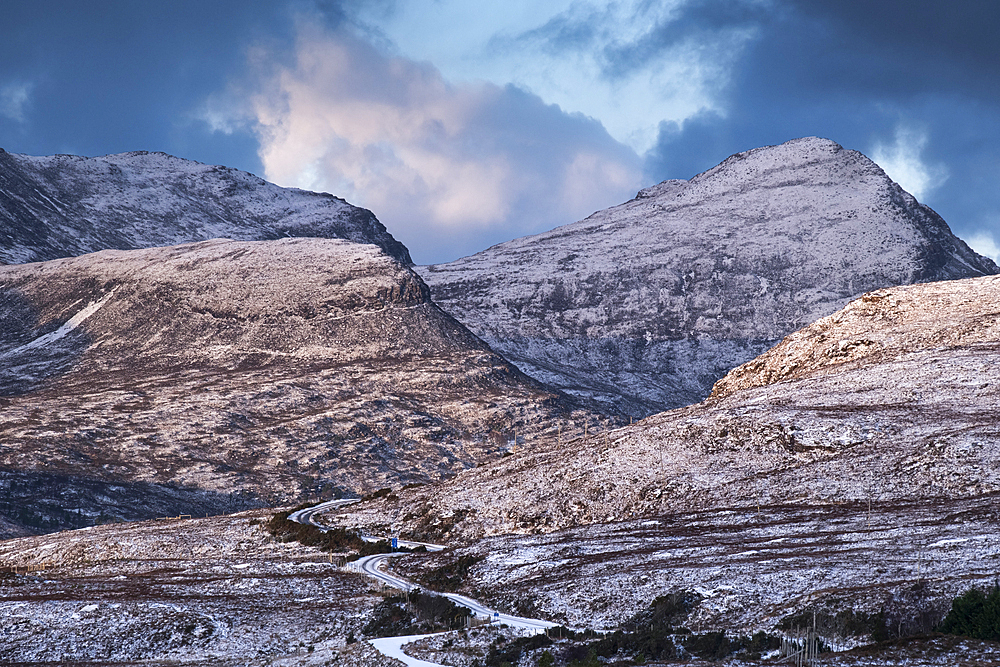 First light on Beinn an Eoin and Sgorr Tuath in winter above the Drumrunie Road, Assynt, Assynt-Coigach National Scenic Area, Sutherland, Scottish Highlands, Scotland, United Kingdom, Europe