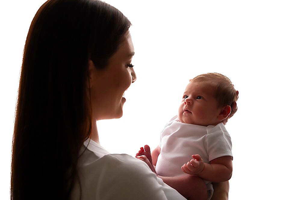 Mother with a baby, studio shot, United Kingdom, Europe