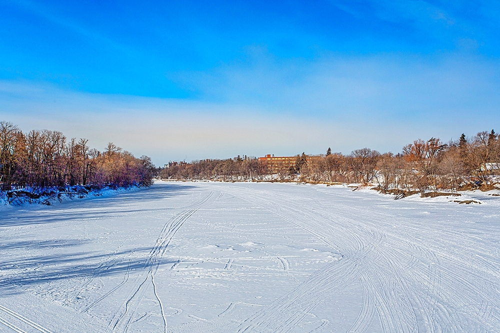 The frozen Assiniboine River in Winnipeg, Manitoba, Canada, North America