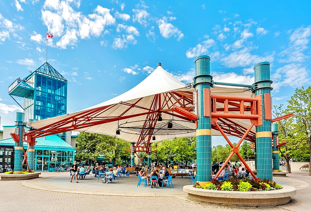 The Forks Market Plaza, used for skating in winter and arts performances in summer, at the Forks, the confluence of the Red and Assiniboine Rivers, in the historic centre of Winnipeg, Manitoba, Canada, North America