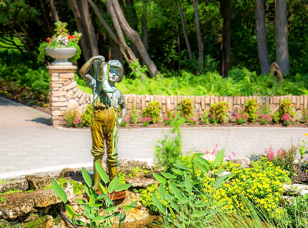 Boy with the Boot statue and fountain, first displayed in 1898, Assiniboine Park, Winnipeg, Manitoba, Canada, North America