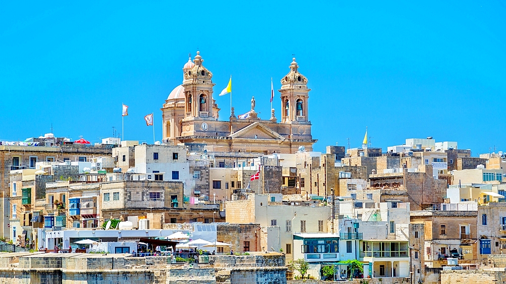 The Basilica of the Nativity of Mary rising over Senglea, Valletta, Malta, Mediterranean, Europe