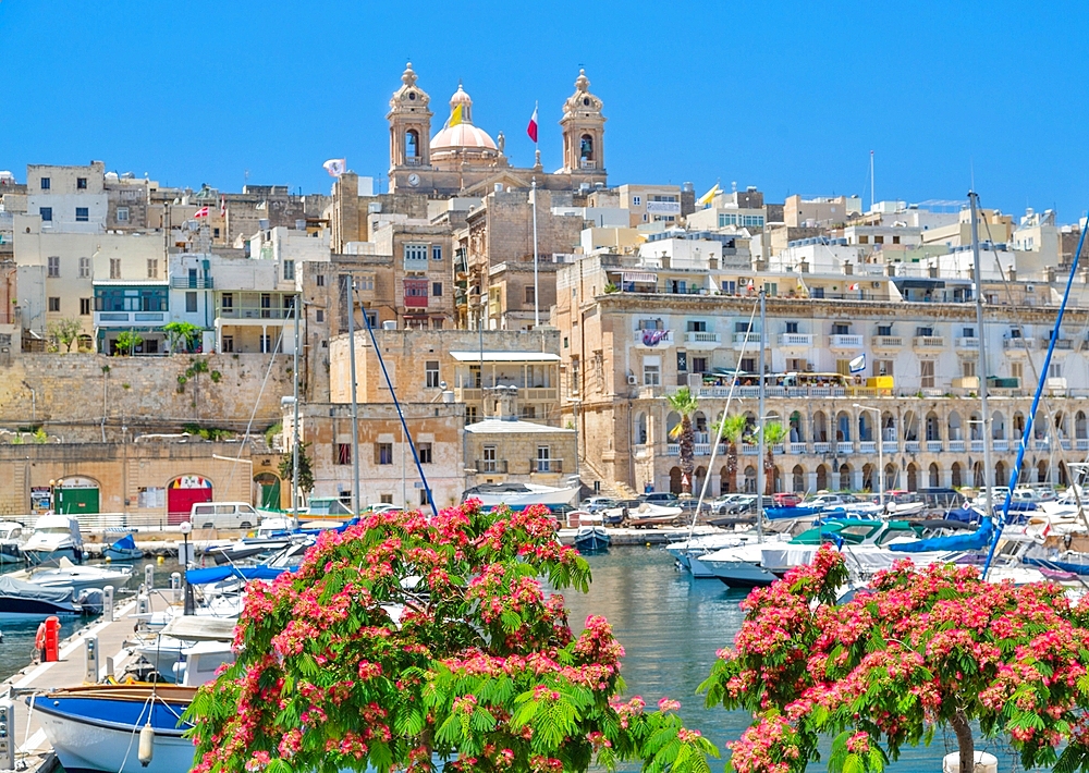 The Basilica of the Nativity of Mary rising over Senglea and the Vittoriosa Yacht Marina, Valletta, Malta, Mediterranean, Europe