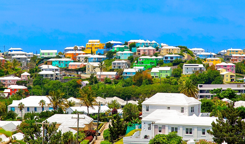 Bermuda skyline with the traditional pastel coloured houses with stepped roofs to catch the rain, Bermuda, Atlantic, North America