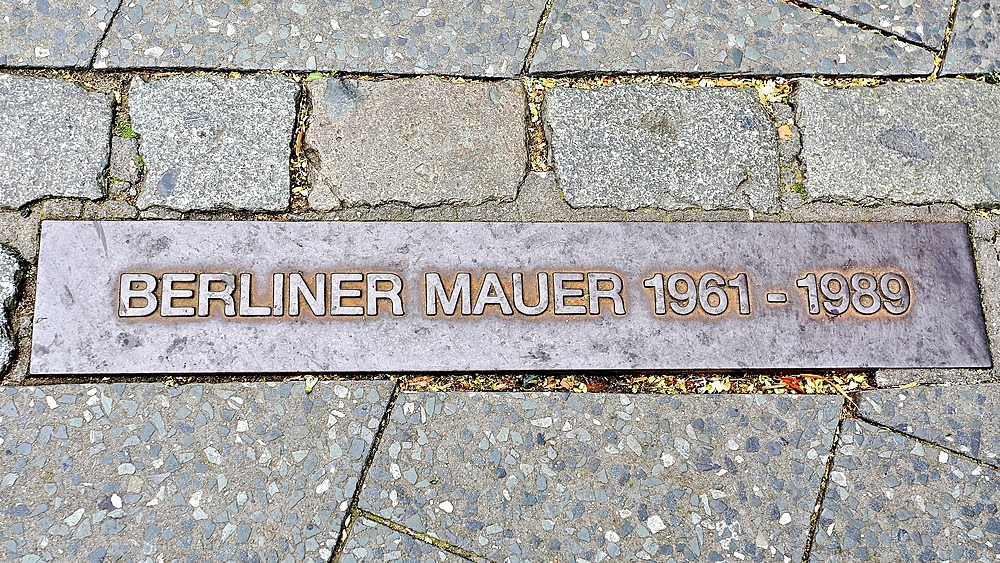 Plaque marking the site of the Berlin Wall in Potsdamerplatz, Berlin, Germany