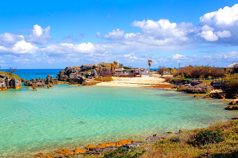 Tobacco Bay, at the North East of Bermuda, is a popular tourist attraction for its beach and snorkeling. It was the scene of Bermuda's Gunpowder Plot in 1775 when locals stole British gunpowder and sent it to America to arm those seeking independence.