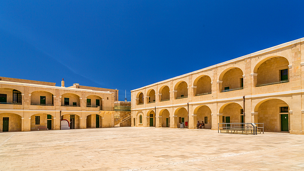 The Piazza d'Armi (Parade Ground) at Fort St Elmo, Valletta, Malta. There are barracks on three sides of the square which were built in 1730 by the Order of St John.