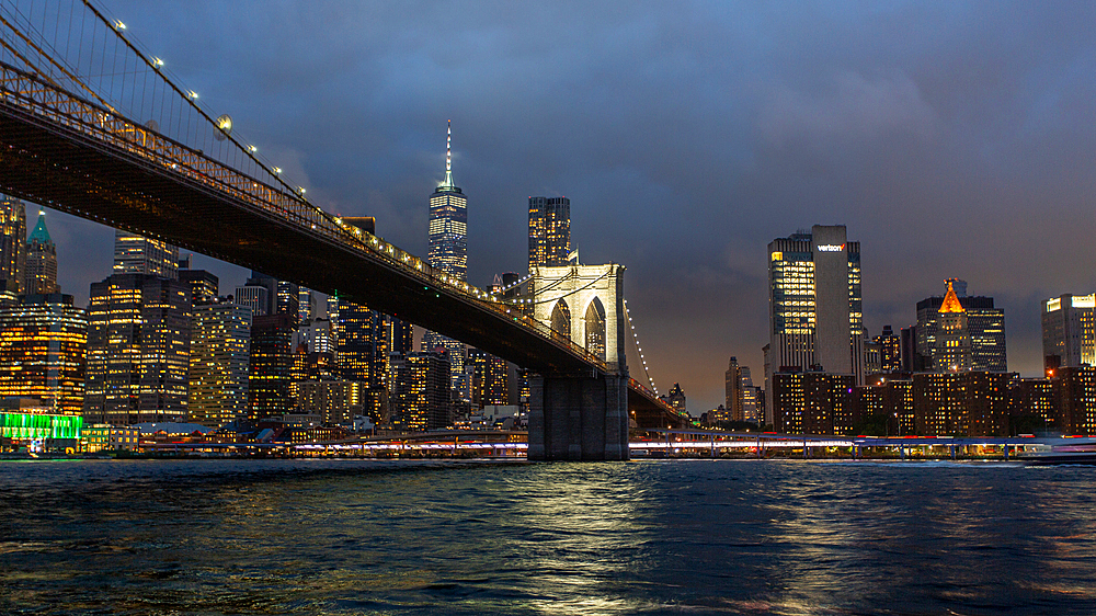 Brooklyn Bridge, New York City, spanning the East River between Manhattan and Brooklyn. When built in 1883 it was the longest suspension bridge in the world and carried railway lines until 1950.