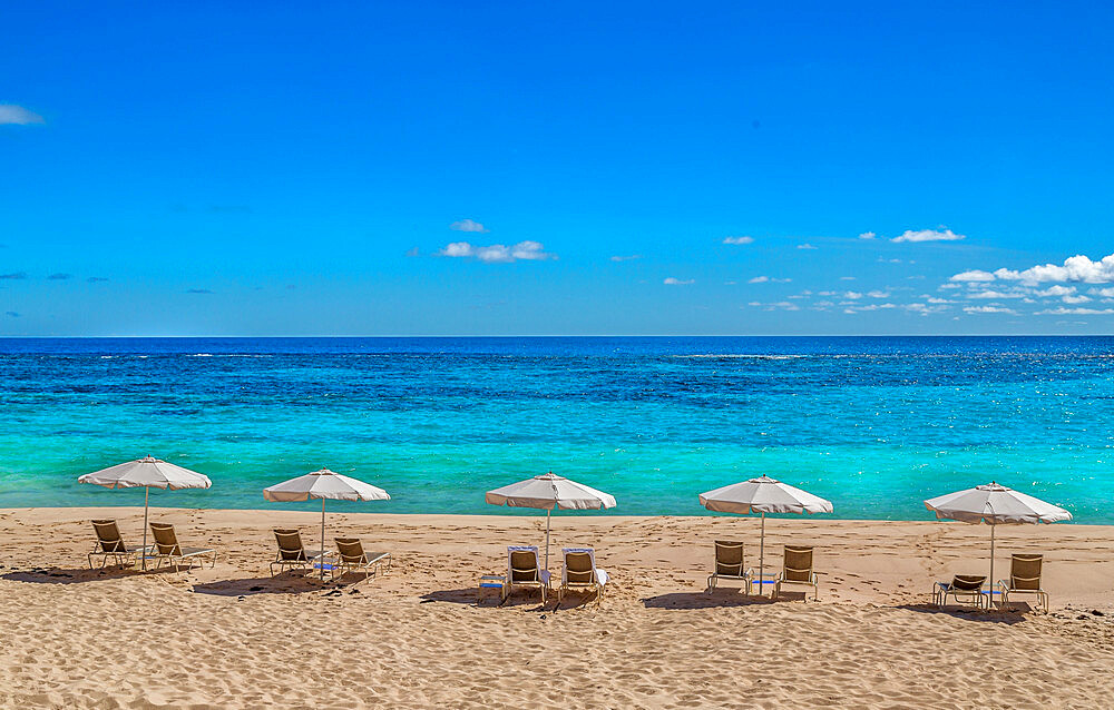 Loungers and umbrellas on Pink Beach West, Smiths, Bermuda, Atlantic, Central America