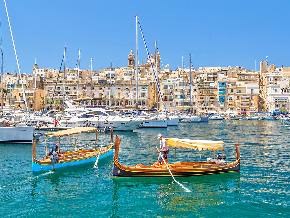 Traditional water taxis at The Three Cities, Grand Harbour, Valletta, Malta, Mediterranean, Europe