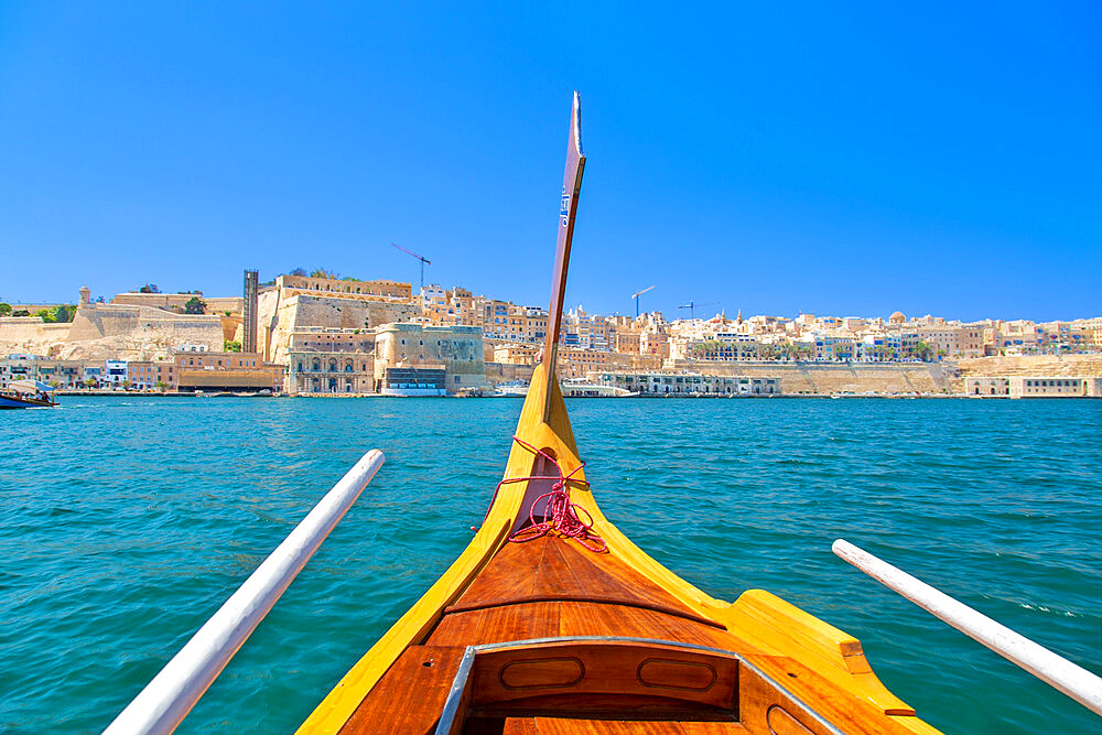 Traditional water taxi crossing the Grand Harbour, Valletta, Malta, Mediterranean, Europe