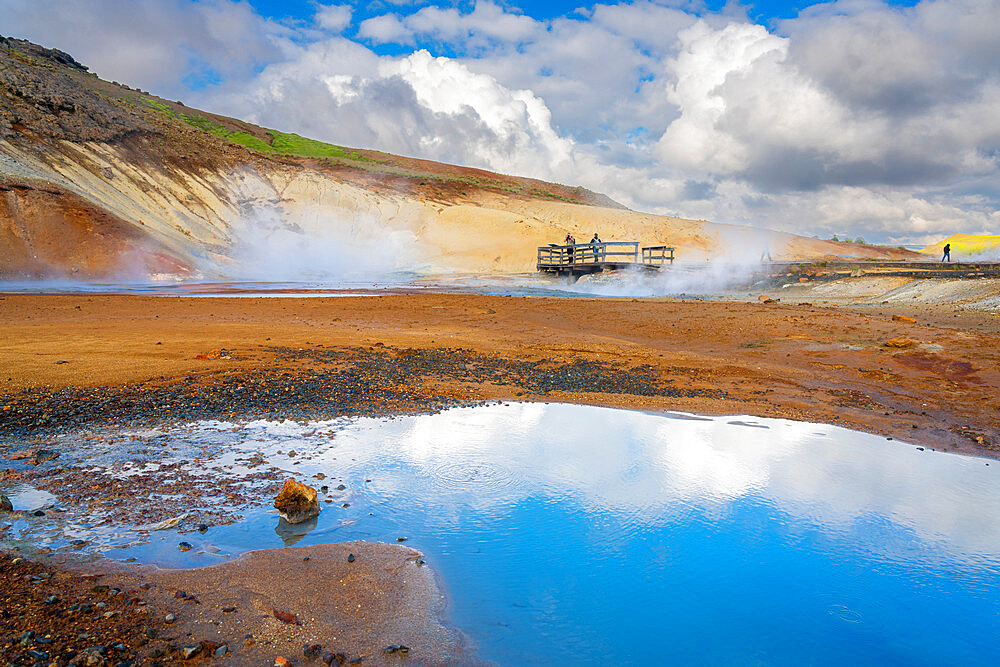 Tourists visiting geothermal area and hot springs at Seltun Hot Springs, Krysuvik, The Capital Region, Iceland