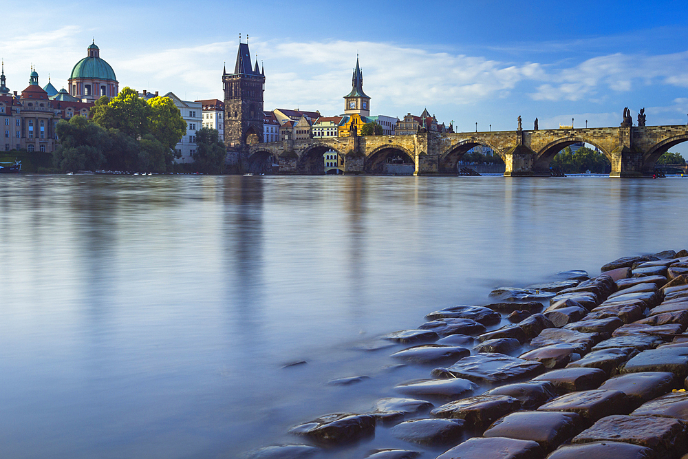 Charles Bridge, OId Town Bridge Tower and dome of St. Francis of Assisi Church by Vltava River, UNESCO World Heritage Site, Prague, Czech Republic (Czechia), Europe