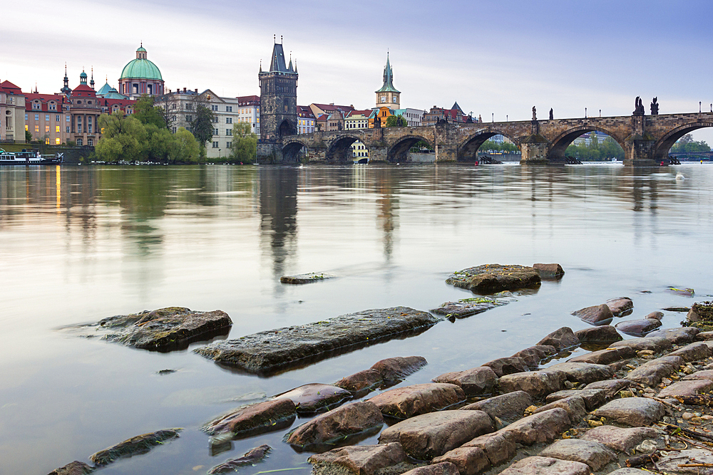 Charles Bridge, OId Town Bridge Tower and dome of St. Francis of Assisi Church by Vltava River, UNESCO World Heritage Site, Prague, Czech Republic (Czechia), Europe