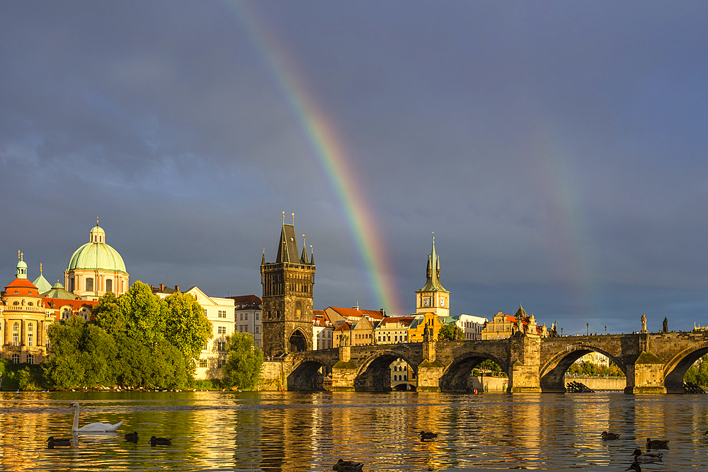 Rainbow above Charles Bridge at sunset, UNESCO World Heritage Site, Old Town, Prague, Czech Republic (Czechia), Europe